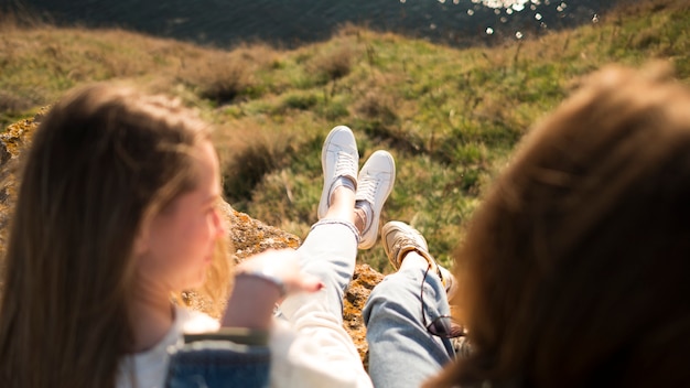 Free Photo best female friends from behind shot