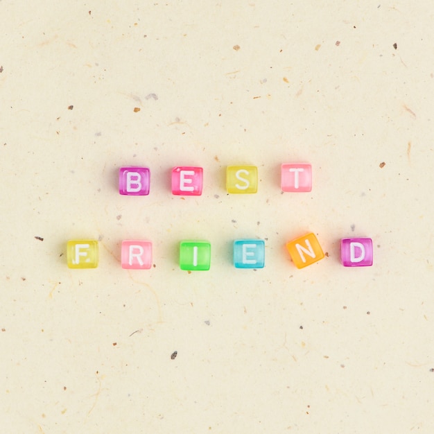 Free photo best friend word beads alphabet