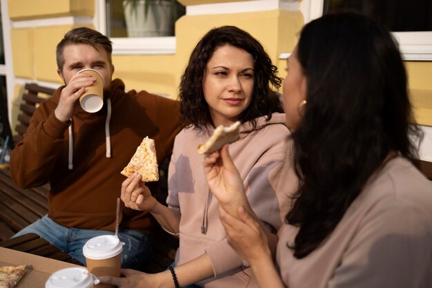 Best friends eating some street food