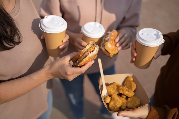 Free Photo best friends eating street food