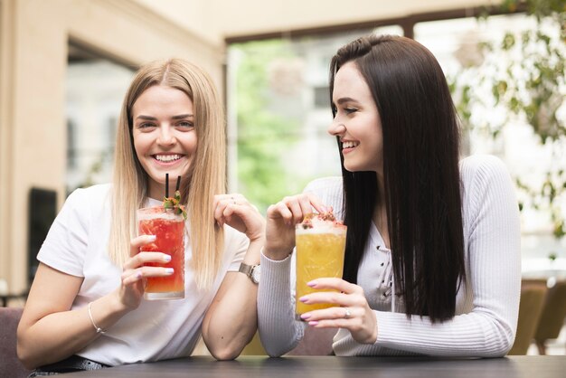 Best friends enjoying their cocktails