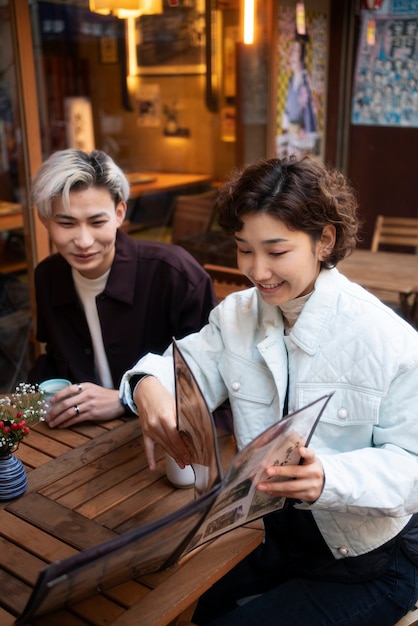 Free photo best friends hanging out at a restaurant