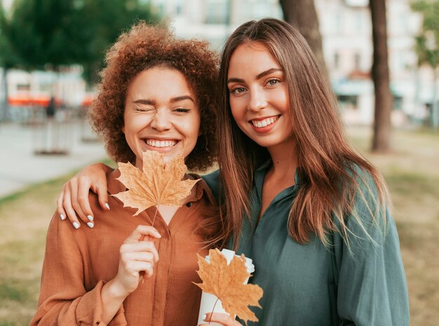 Best friends spending time together outdoors in autumn