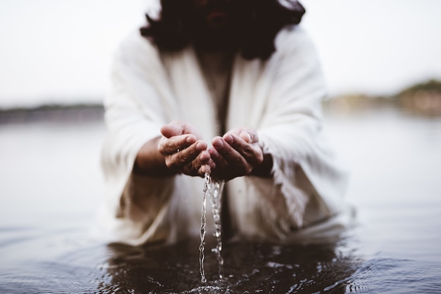 Biblical scene - of Jesus Christ drinking water with his hands