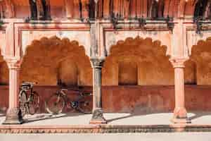 Free photo bicycle parking at indian building in islamic style