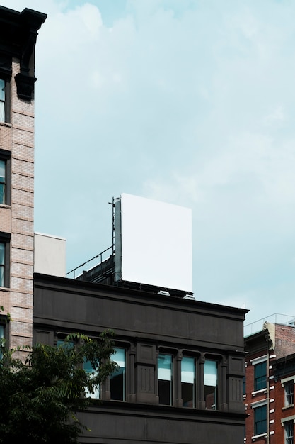 Free photo big billboard template on building in city