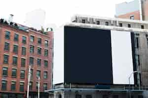 Free photo big billboard template on building in city