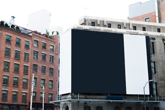 Big billboard template on building in city