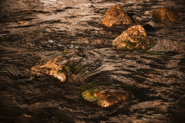 Free Photo big black rocks of cliff 