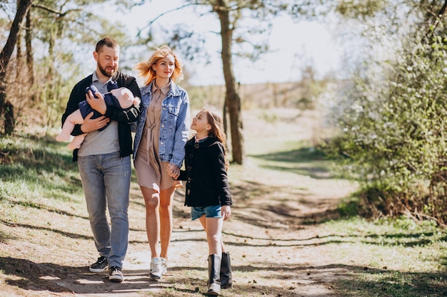 Big family with kids together in the forest