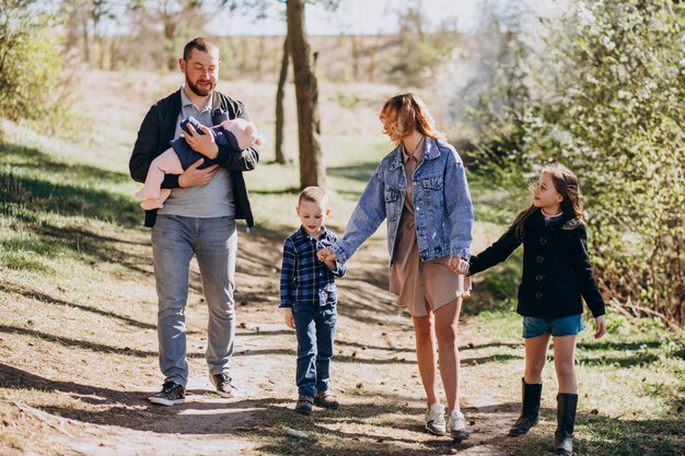 Big family with kids together in the forest