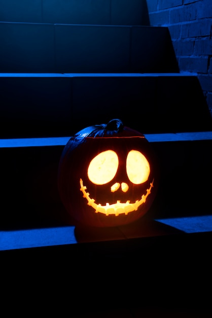 Big halloween pumpkin on stairs