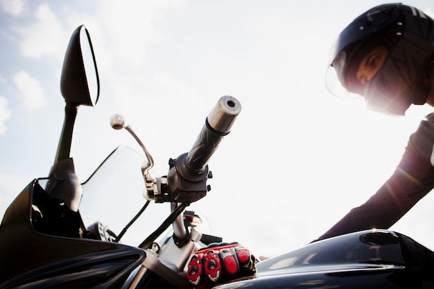 Biker in helm on the motorbike