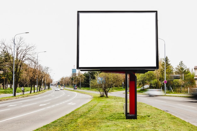 Free photo billboard blank for outdoor advertising in the middle of the road