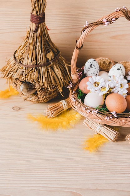 Free photo bird hut near basket with eggs