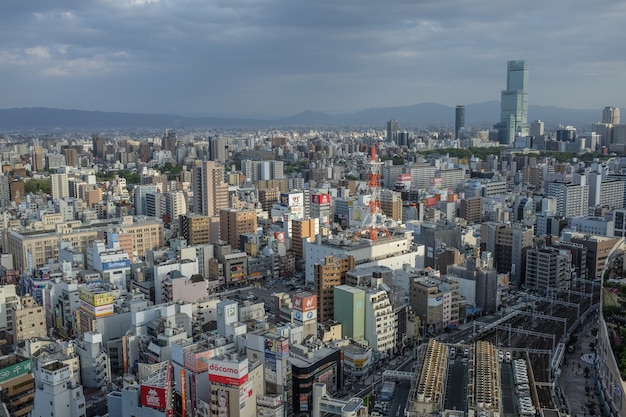 Free photo birds-eye shot of the japanese city, osaka with a lot of buildings,