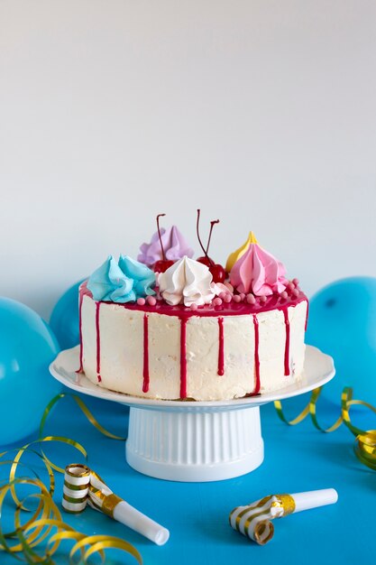 Birthday cake on blue table