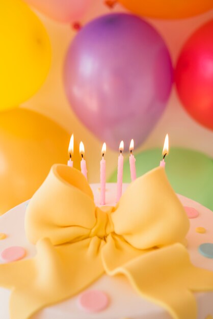 Birthday cake with balloons