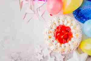 Free photo birthday decoration around cake