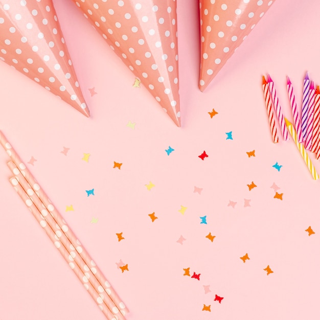 Birthday elements on pink background