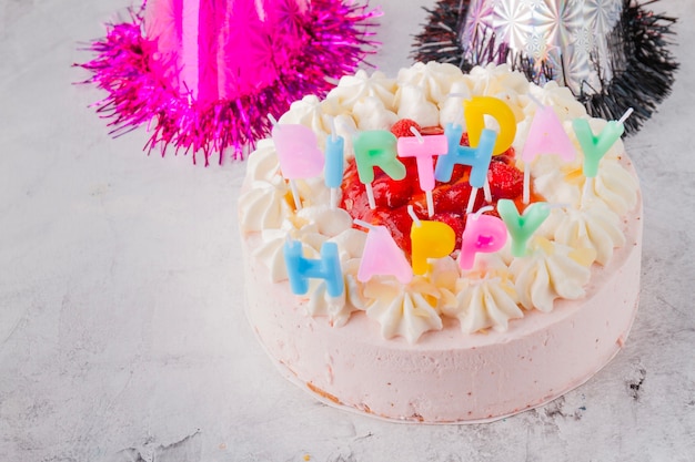 Birthday hats and cake with candles