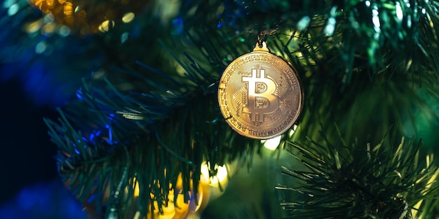 Free photo bitcoin coin on christmas tree with bokeh lights finance concept