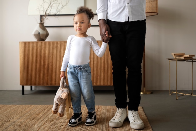 Black baby spending time with her dad