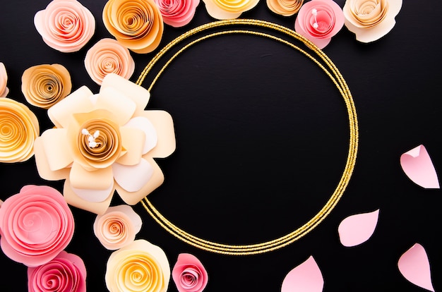 Free photo black background with elegant paper flowers frame