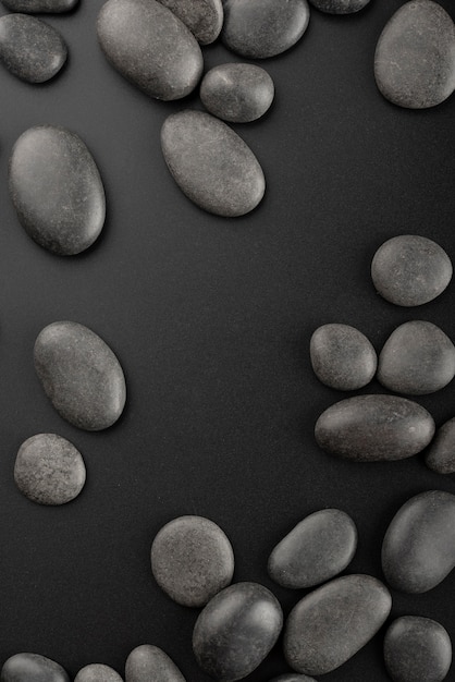 Free Photo black background with rocks