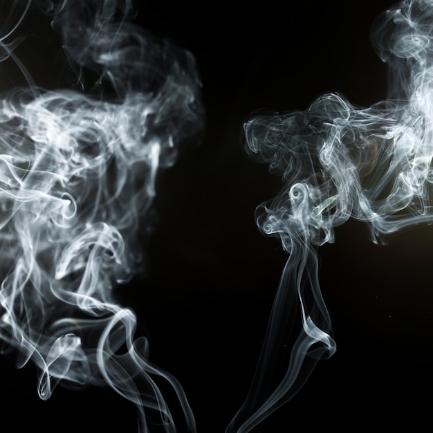 Free photo black background with smoke effect