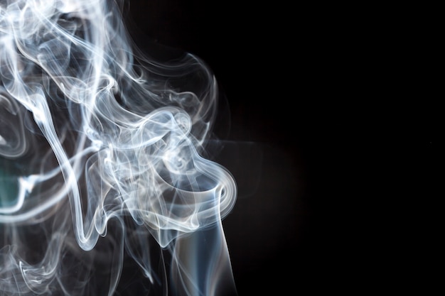 Free photo black background with smoke