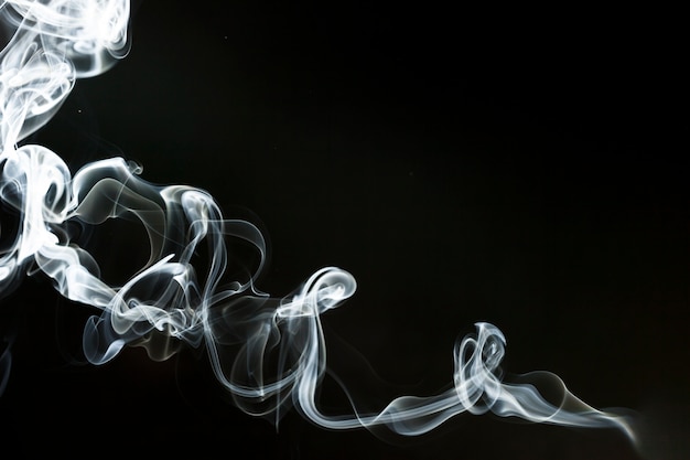 Black background with wavy smoke silhouette