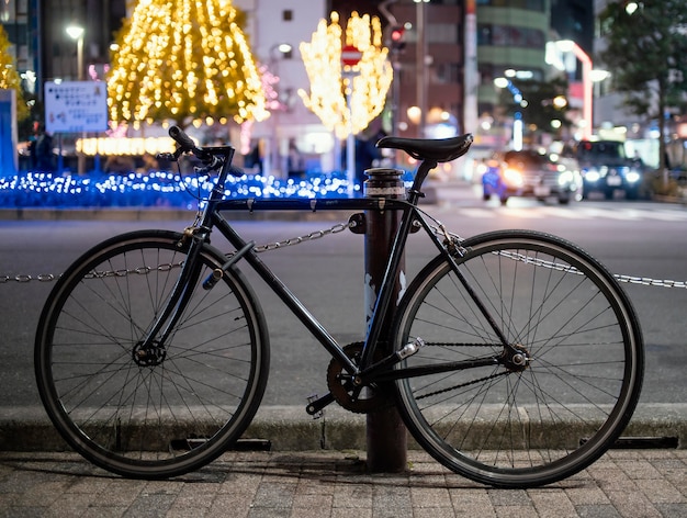 Free photo black bicycle urban background