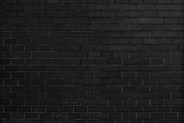 Free photo black brick wall textured background