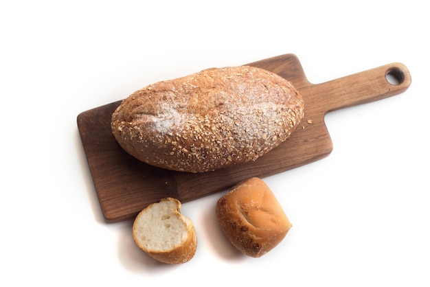 Black coffee and whole wheat bread for breakfast on white background