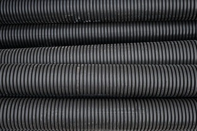 Free Photo black construction pipes coated corrugated pipes for road and electrical network repair top view reconstruction and improvement of the social infrastructure of cities