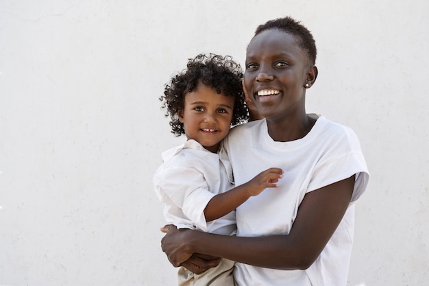 Black family enjoying time in natural location