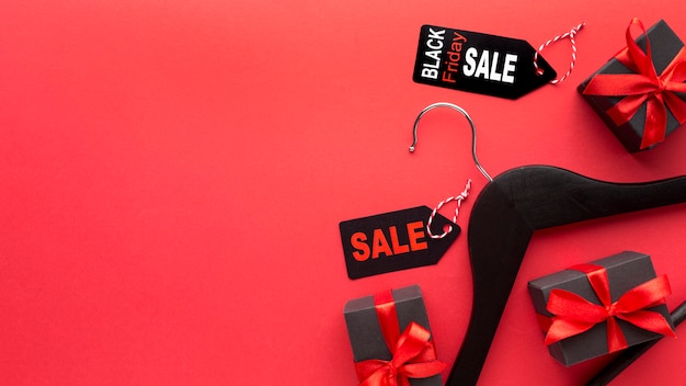 Free photo black friday composition on red background with copy space