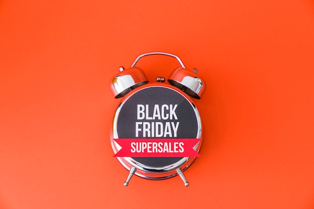 Black friday concept with alarm clock