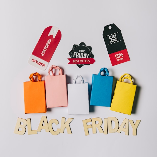 Free Photo black friday concept with bags and labels