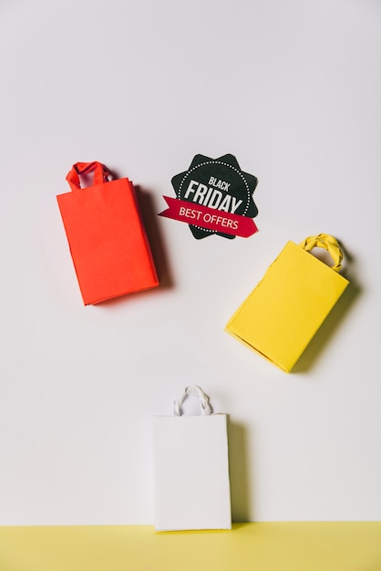 Free Photo black friday concept with three bags and label