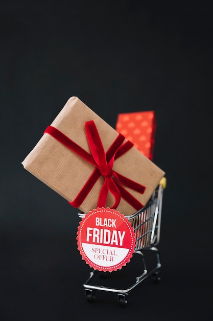 Free photo black friday decoration two gift boxes in shopping cart