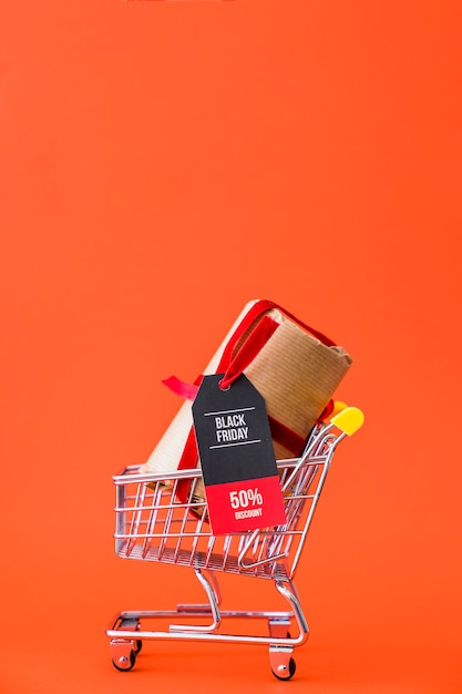 Black friday decoration with present in cart