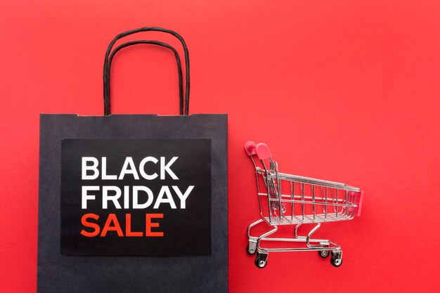 Black friday elements arrangement on red background