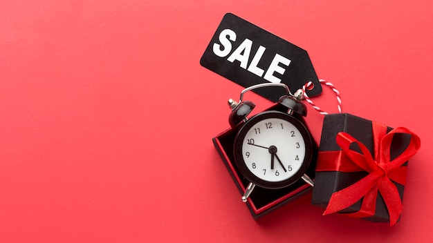 Black friday elements composition on red background with copy space