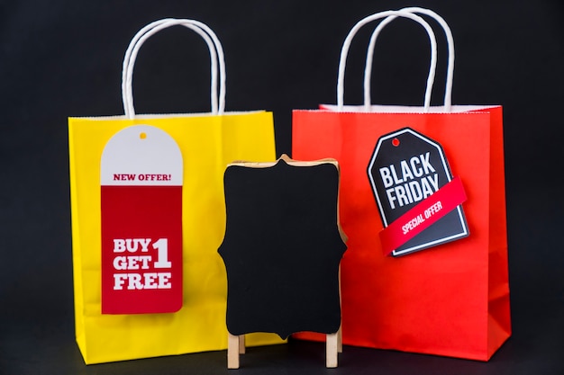 Free Photo black friday sales concept with two bags