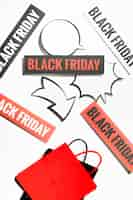 Free photo black friday signs with conversation clouds and shopping bags