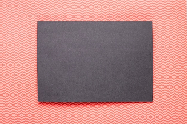 Free photo black invitation with orange background