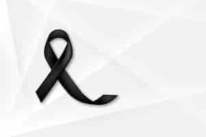 Free photo black mourning ribbon with white background