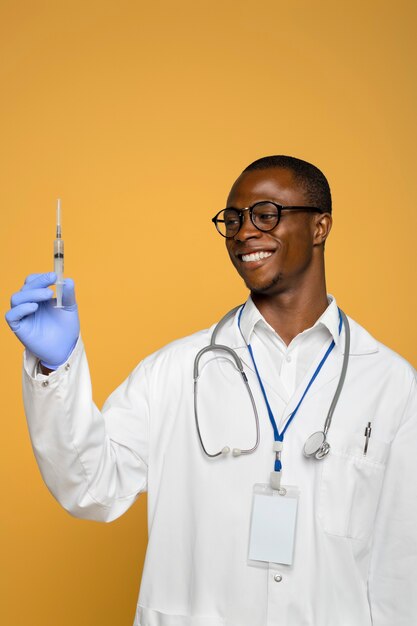 Black nurse man getting ready for work